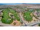 Wide aerial shot capturing the community with a beautiful golf course and mountain views at 949 Via Stellato St, Henderson, NV 89011