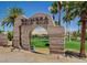 Picturesque entrance to Chimera Golf Club with scenic views of lush green fairways at 949 Via Stellato St, Henderson, NV 89011