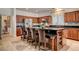Kitchen features granite countertops, a large island, and modern stainless steel appliances at 949 Via Stellato St, Henderson, NV 89011