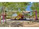 Neighborhood playground with shade structure and play equipment for outdoor enjoyment at 949 Via Stellato St, Henderson, NV 89011