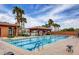 Long and refreshing community swimming pool with clear water and relaxing poolside space at 949 Via Stellato St, Henderson, NV 89011