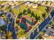 Aerial view showcasing community tennis courts and well-maintained landscaping at 949 Via Stellato St, Henderson, NV 89011