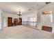 Upstairs living area with carpeting, chandelier lighting, and wood built ins at 949 Via Stellato St, Henderson, NV 89011