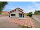 View of the backyard showing the deck, patio, and the home's exterior at 9529 Shallow Brook Cir, Las Vegas, NV 89117