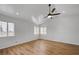 Bright bedroom with ceiling fan and windows with blinds at 9529 Shallow Brook Cir, Las Vegas, NV 89117