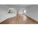Expansive living room area featuring wood floors and lots of natural light at 9529 Shallow Brook Cir, Las Vegas, NV 89117