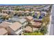 Aerial view of the neighborhood, showing the backyard gravel area and block fence at 9617 Fast Elk St, Las Vegas, NV 89143