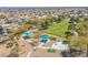 Community playground featuring mature trees, walking paths, and shade structures at 9617 Fast Elk St, Las Vegas, NV 89143