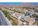 Aerial view of the neighborhood, showing the backyard gravel area and block fence at 9617 Fast Elk St, Las Vegas, NV 89143