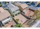 Aerial view of the house showing backyard with gravel and brick paver patio area and block fence perimeter at 9617 Fast Elk St, Las Vegas, NV 89143