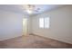 Bright bedroom with fan and walk in closet at 9617 Fast Elk St, Las Vegas, NV 89143