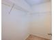 Walk-in closet features built in shelving units for maximum storage, with carpet flooring at 9617 Fast Elk St, Las Vegas, NV 89143