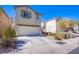 A charming two-story home featuring a two-car garage and low-maintenance landscaping at 9617 Fast Elk St, Las Vegas, NV 89143