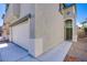 A charming two-story home with a two-car garage and a nicely paved driveway at 9617 Fast Elk St, Las Vegas, NV 89143