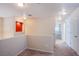 Upstairs hallway features neutral carpet and an alcove at 9617 Fast Elk St, Las Vegas, NV 89143