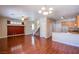 A view of open living area showcasing the living room, staircase, and kitchen at 9617 Fast Elk St, Las Vegas, NV 89143