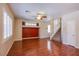An open living room features hardwood floors, recessed lighting, and a staircase at 9617 Fast Elk St, Las Vegas, NV 89143