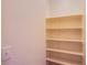 Walk-in pantry with shelving provides ample storage space at 9617 Fast Elk St, Las Vegas, NV 89143