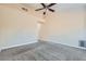Bedroom with carpet, ceiling fan, and an attached walk-in closet at 9920 Netherton Dr, Las Vegas, NV 89134