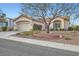 Attractive single-story house showcasing a two-car garage and tidy front yard at 9920 Netherton Dr, Las Vegas, NV 89134