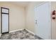 Room with tile floors, featuring a fire extinguisher and a storage cabinet, offers functional space at 9920 Netherton Dr, Las Vegas, NV 89134