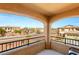 Balcony view of quiet neighborhood street with homes and parked cars at 10133 Longoria St, Las Vegas, NV 89178