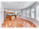 Open kitchen featuring a functional island, ample cabinetry, and terracotta tile flooring at 10639 Isola Bella St, Las Vegas, NV 89141