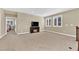 Well lit bonus room with tv and plush carpets and neutral walls at 10792 Crestview Pointe Ave, Las Vegas, NV 89166