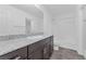 Bathroom with vanity, gray countertops, and shower/tub combo at 12367 Indigo Montage Rd # 3, Las Vegas, NV 89183