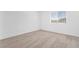 Bright bedroom with neutral carpet, large window, and ample natural light at 12367 Indigo Montage Rd # 3, Las Vegas, NV 89183