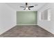 Bedroom featuring a ceiling fan and modern, wood look flooring at 12367 Indigo Montage Rd # 3, Las Vegas, NV 89183