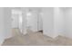 Hallway with access to multiple rooms with carpet flooring at 12367 Indigo Montage Rd # 3, Las Vegas, NV 89183