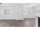 Bright living room with wood-look flooring, and white walls at 12367 Indigo Montage Rd # 3, Las Vegas, NV 89183