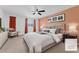 Serene bedroom with a king bed, soft lighting, neutral tones, and ample space at 12367 Indigo Montage Rd # 3, Las Vegas, NV 89183