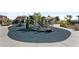Community playground with modern equipment and safe, cushioned ground cover for children at 12367 Indigo Montage Rd # 3, Las Vegas, NV 89183