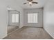 Bright bedroom with carpet, ceiling fan, and mirrored closet at 1900 N Torrey Pines Dr # 216, Las Vegas, NV 89108