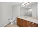 Modern bathroom with marble countertops and wood cabinets, exuding luxury at 200 W Sahara Ave # 3004, Las Vegas, NV 89102