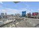 Balcony view with scenic city buildings, hotels, and desert landscape for a high-rise living experience at 200 W Sahara Ave # 3004, Las Vegas, NV 89102