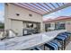 Modern outdoor kitchen area with stainless steel appliances and bar seating at 200 W Sahara Ave # 3004, Las Vegas, NV 89102