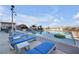 Community pool surrounded by chaise lounges and resort-style amenities at 200 W Sahara Ave # 3004, Las Vegas, NV 89102