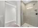 Bright shower stall featuring glass door and modern fixtures, next to doorway at 200 W Sahara Ave # 3004, Las Vegas, NV 89102