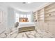 Cozy bedroom with built-in bookshelves and a bay window with shutters at 2101 Diamond Bar Dr, Las Vegas, NV 89117