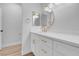 This bathroom features modern lighting, sleek fixtures, and pristine white cabinetry at 2110 Los Feliz St # 1037, Las Vegas, NV 89156