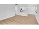 Open-concept living room features neutral walls, new wood flooring, and plenty of natural light at 2110 Los Feliz St # 1037, Las Vegas, NV 89156