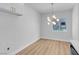 Dining room with recessed lighting and a stylish light fixture, neutral walls, and beautiful flooring at 2110 Los Feliz St # 1037, Las Vegas, NV 89156