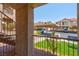 Apartment patio view overlooking the parking lot and a grassy area at 2110 Los Feliz St # 1037, Las Vegas, NV 89156
