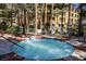 Hot tub set among the trees with seating at 220 E Flamingo Rd # 129, Las Vegas, NV 89169