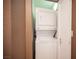 Efficient laundry room features a stacked washer and dryer unit, saving space and adding convenience at 220 E Flamingo Rd # 129, Las Vegas, NV 89169