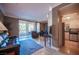 Comfortable living room features a sliding glass door to the balcony and adjoins kitchen and dining at 220 E Flamingo Rd # 129, Las Vegas, NV 89169