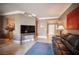 Comfortable living space showcasing tile floors, neutral paint, and open kitchen concept at 220 E Flamingo Rd # 129, Las Vegas, NV 89169